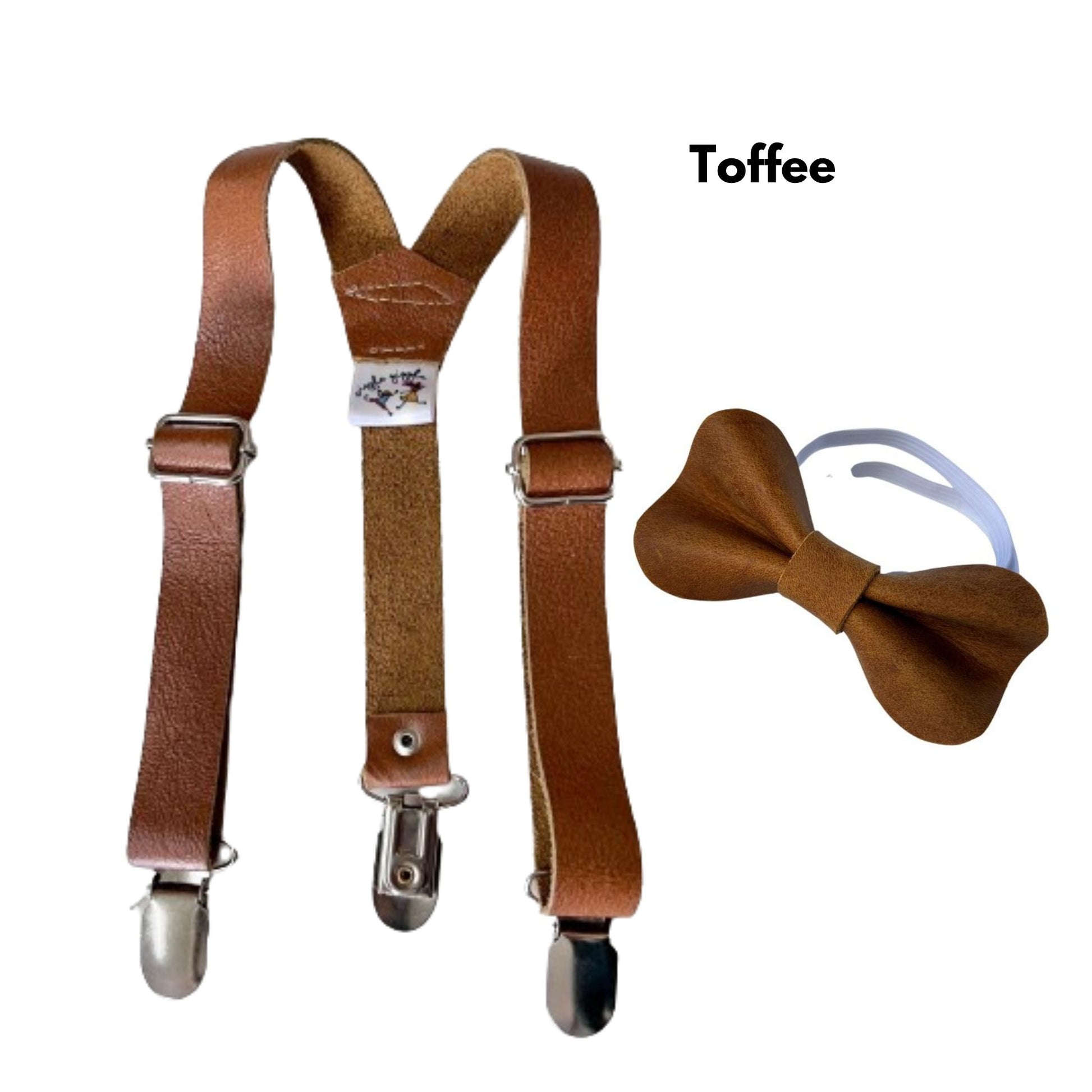 Toffee leather suspenders and bow tie set on a white background.