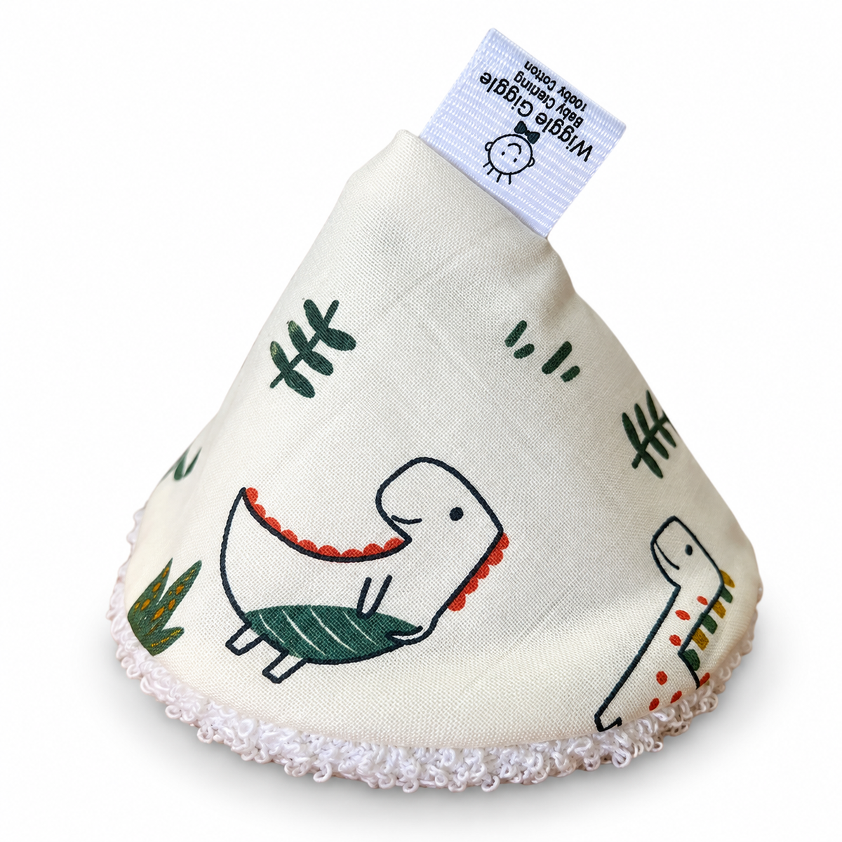 Cream coloured pee pee teepee with dinosaur illustrations on a white background