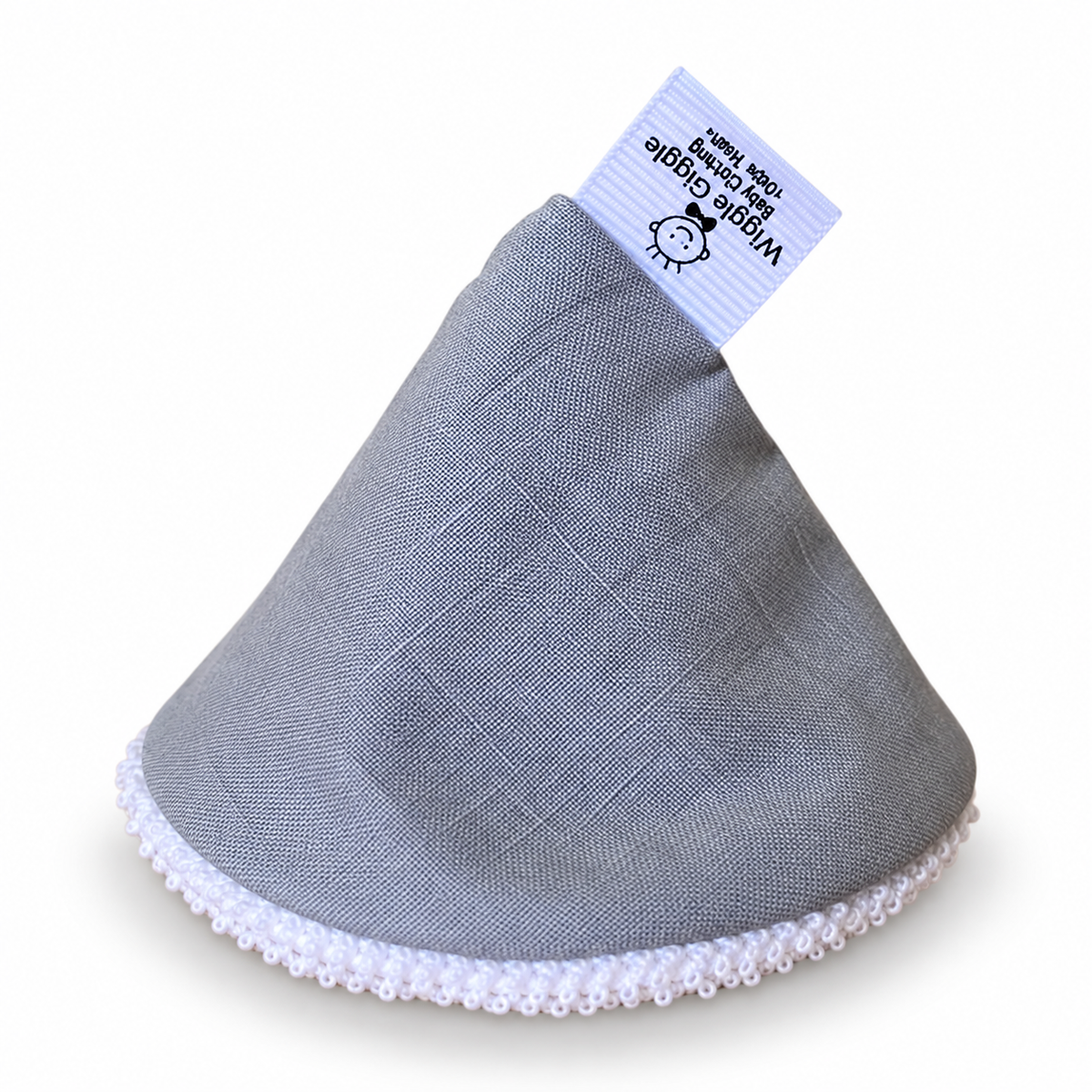 A gray fabric pee pee teepee with a fabric label that reads Wiggle Giggle Baby Clothing