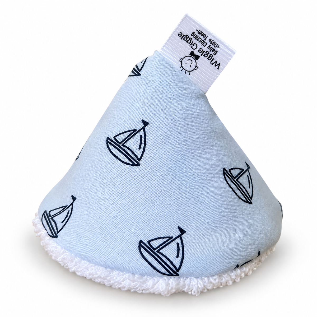 Pee pee teepee with navy sailboat patterns printed on light blue fabric on a white background